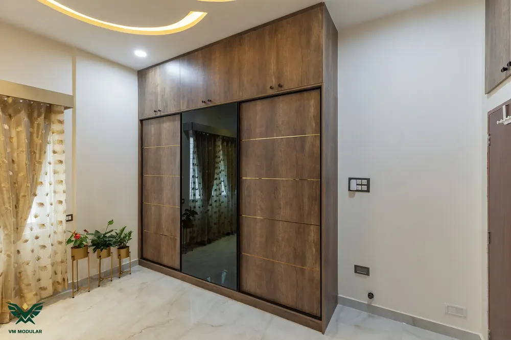 Happy Homes Colony, Bandlaguda, hinged wardrobe in walnut laminate